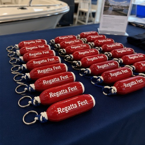 Promotional engraved boat keychains for a boat show booth