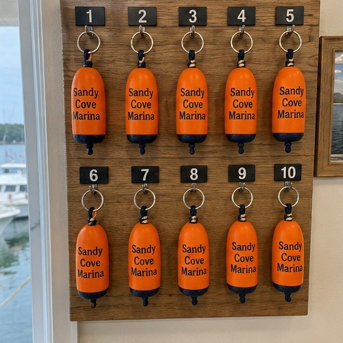 Branded floating keychains for a marina and yacht club